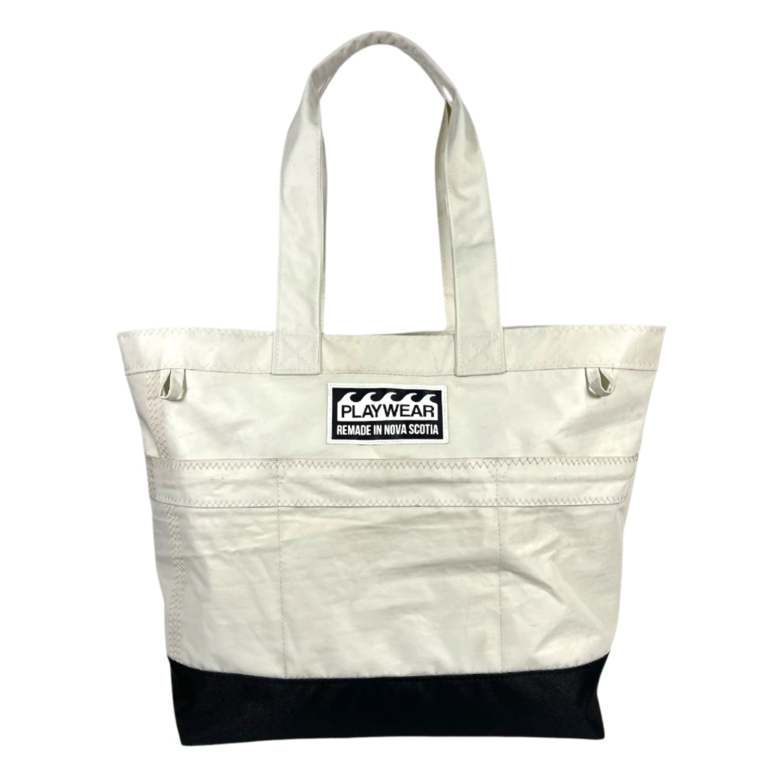 SUSTAINABLY MADE IN CANADA. UPCYCLED BY PLAYWEAR FROM REPURPOSED SAILS. TOTE BAG WITH OUTSIDE POCKETS, LARGE.