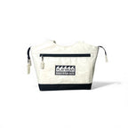 White bag with black accents and a visible brand logo on a white background