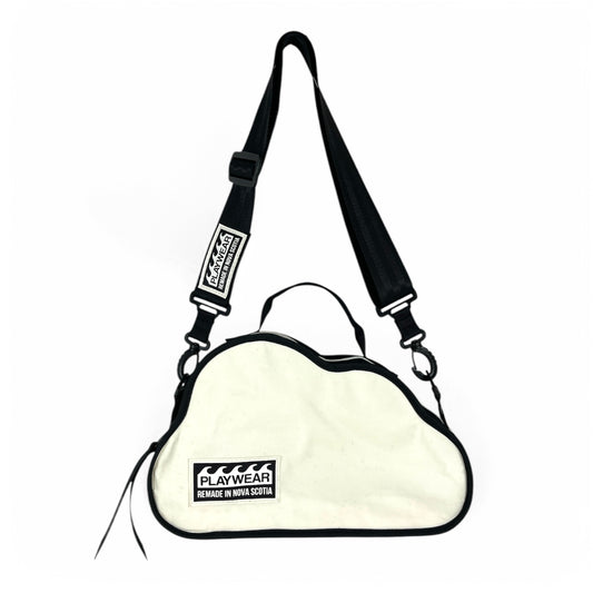 SUSTAINABLY MADE IN CANADA. UPCYCLED BY PLAYWEAR FROM REPURPOSED SAILS. EVERYDAY PURSE SHAPED LIKE A CLOUD.