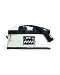White duffel bag with black straps and 'Playwear' logo on a white background