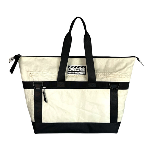 SUSTAINABLY MADE IN CANADA. UPCYCLED BY PLAYWEAR FROM REPURPOSED SAILS. TOTE BAG FOR SAILING OR WEEKEND TRAVEL. WEEKENDER.